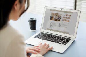 Woman looking at a laptop comuter