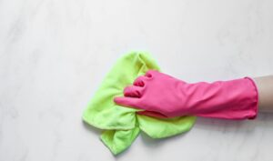 Hands cleaning with dust rag